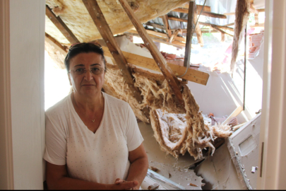 Yokuş çıkarken geri kayan kamyon evine çarptı, kendini dışarı atarak kurtuldu