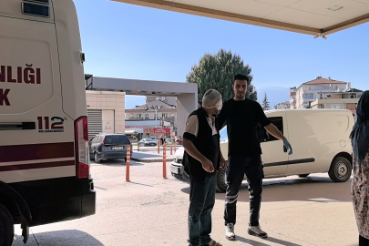 Kriko inince tamir ettiği otomobilinin altında kalıp, yaralandı