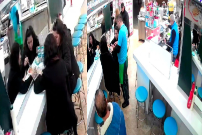 Taksim'de tabağına saç koyan turistleri esnaf dükkandan kovdu; o anlar kamerada