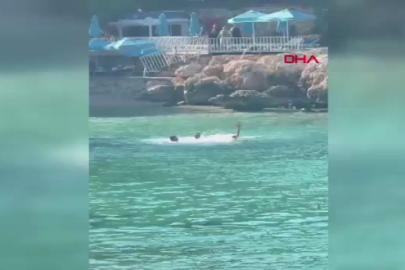 Mersin'de deniz ortasında sopalı kavga
